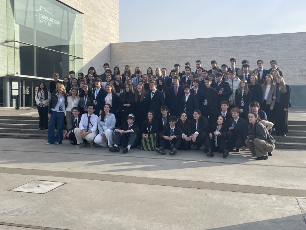 A group of young students embarking on a trip to the European Youth Parliament, excited and ready for a unique learning experience.