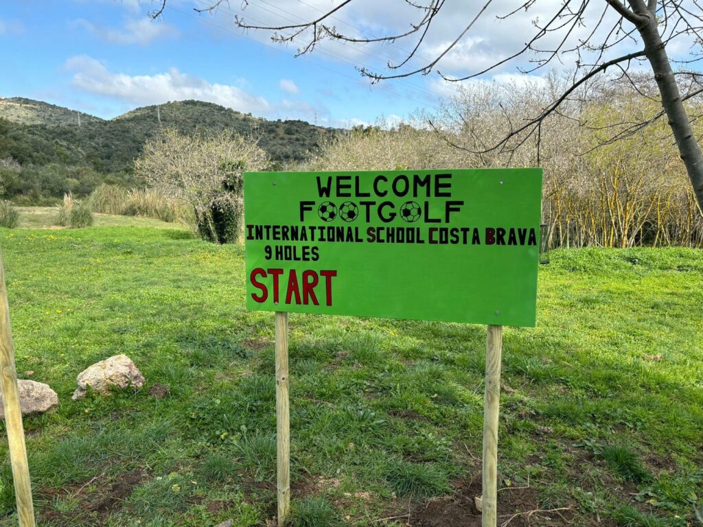 A sign announcing the opening of the new footgolf course on campus, inviting students to try out this exciting new sport.