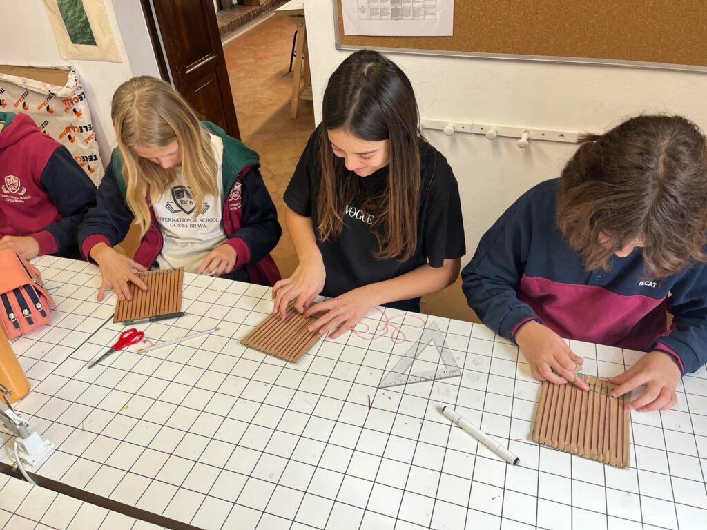 Secondary students learning the ancient art of tapestry