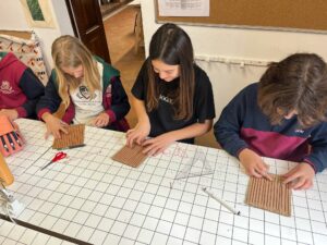 Secondary students learning the ancient art of tapestry