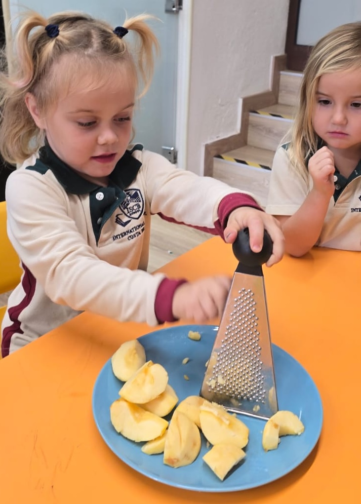 Pupil Chopping an Apple