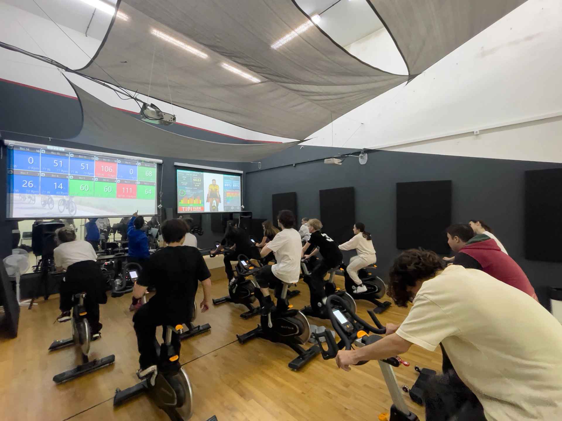 Students working hard in a spinning session