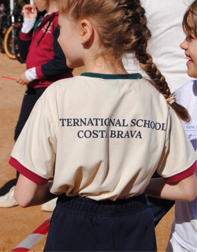 Primary student backwards with iscb uniform